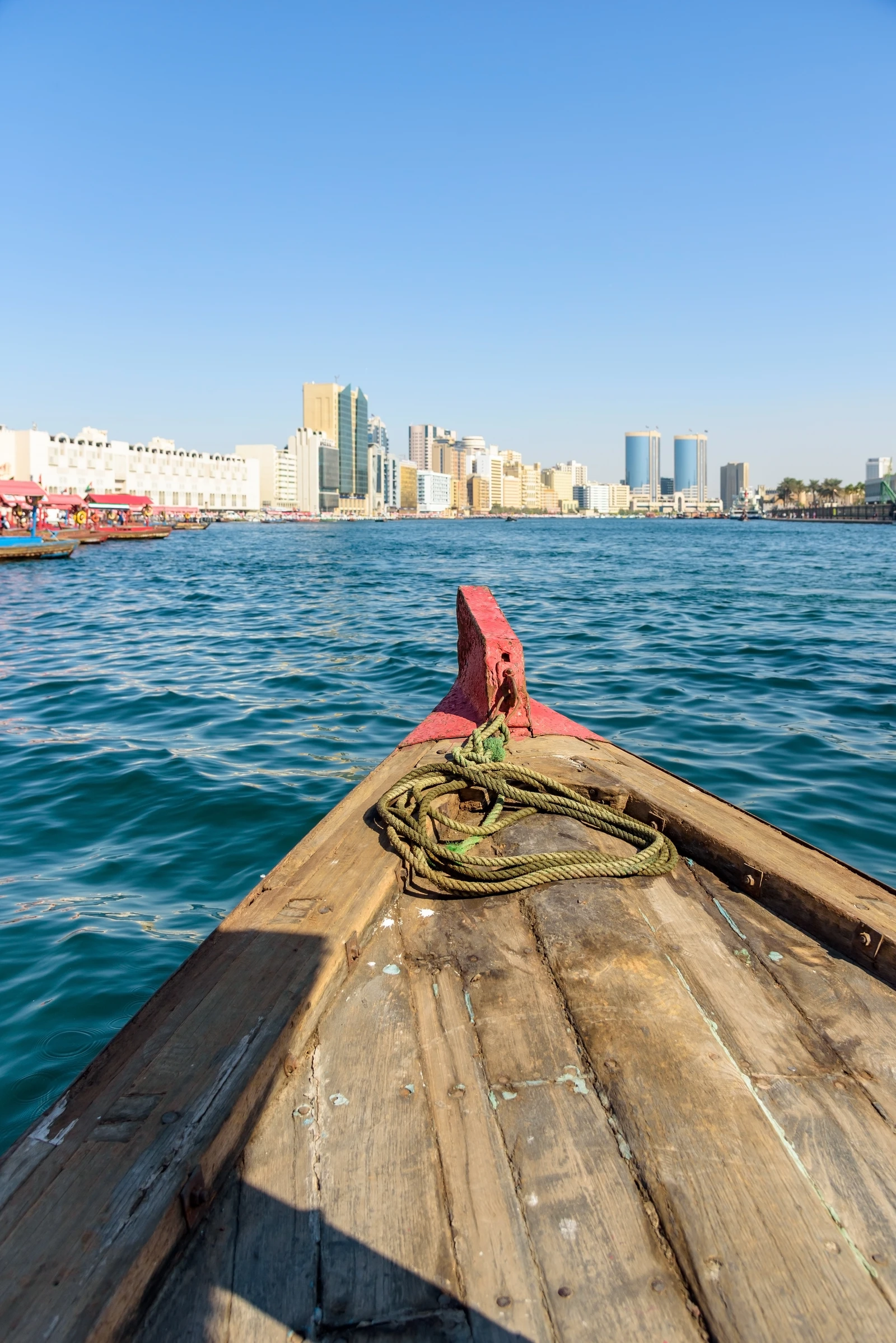 Deira waterfront across Dubai Creek, seen from a traditional abra boat